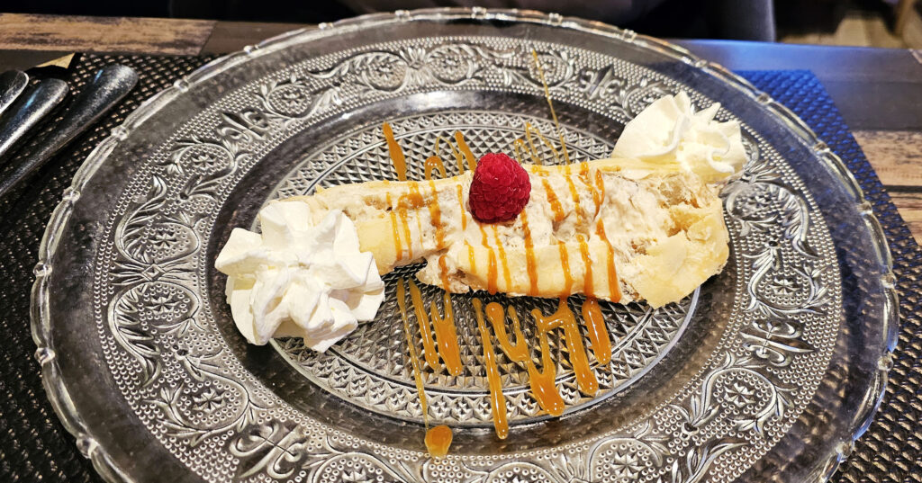 Millefeuille de crêpes à la banane, coulis caramel (banana crepe mille-feuille) at Brasserie Saint Roch in Serignan, France