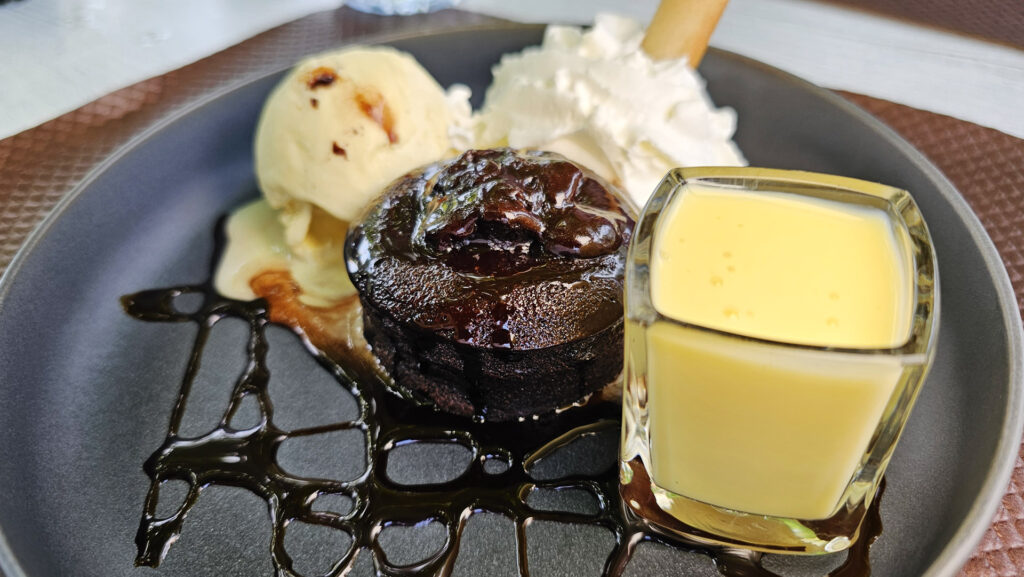 The fondant au chocolat with creme anglaise dessert from O'Berges du Canal restaurant in Villeneuve-lès-Béziers